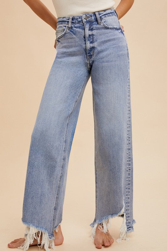 THE ASYMMETRICAL DISTRESSED STRAIGHT JEANS