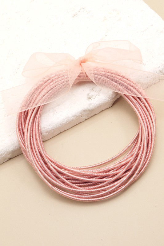 GUITAR STRING BRACELET IN ROSE GOLD